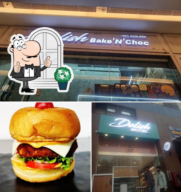 The photo of exterior and burger at Delish Bake N Choc