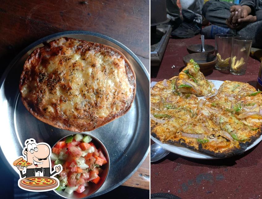 Pick pizza at Devraj Guest House and Cafe
