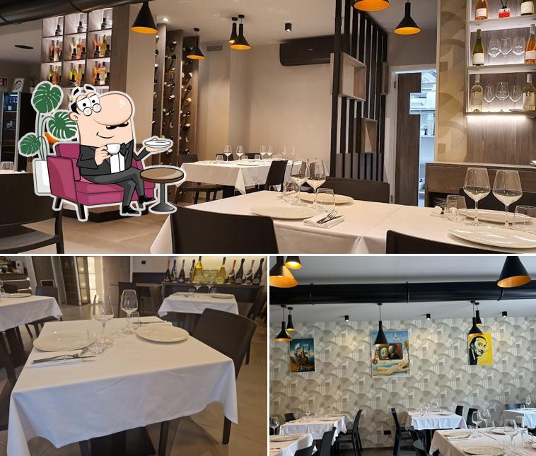 Dai un'occhiata agli interni di Osteria Dalì