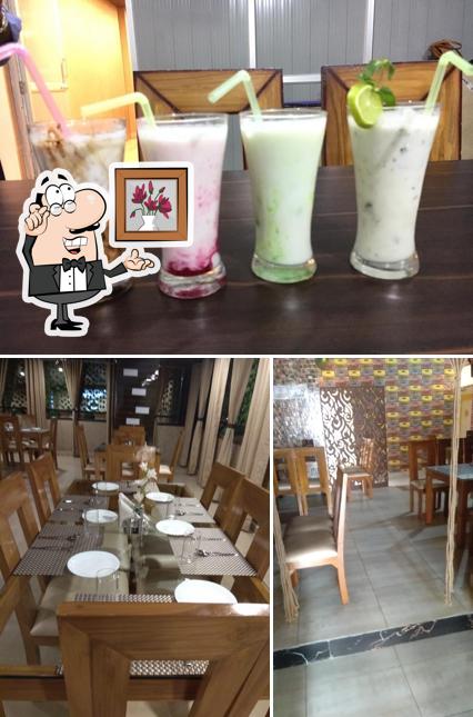 Take a look at the image showing interior and beverage at Daily Dose Restaurant & Hotel