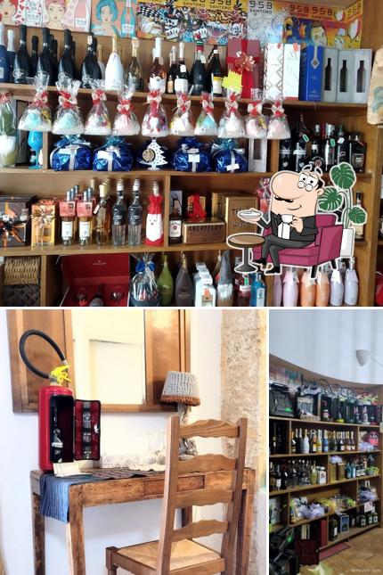 Siediti a un tavolo di La Dimora Dei Vini Enoteca
