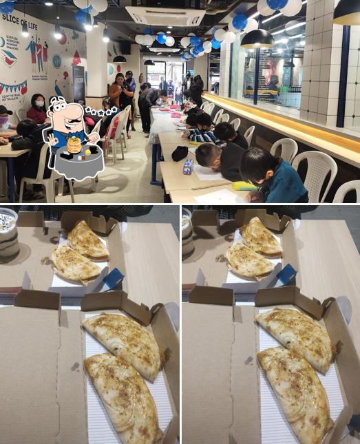 Among different things one can find food and interior at Domino's Pizza High School Colony, Kohima