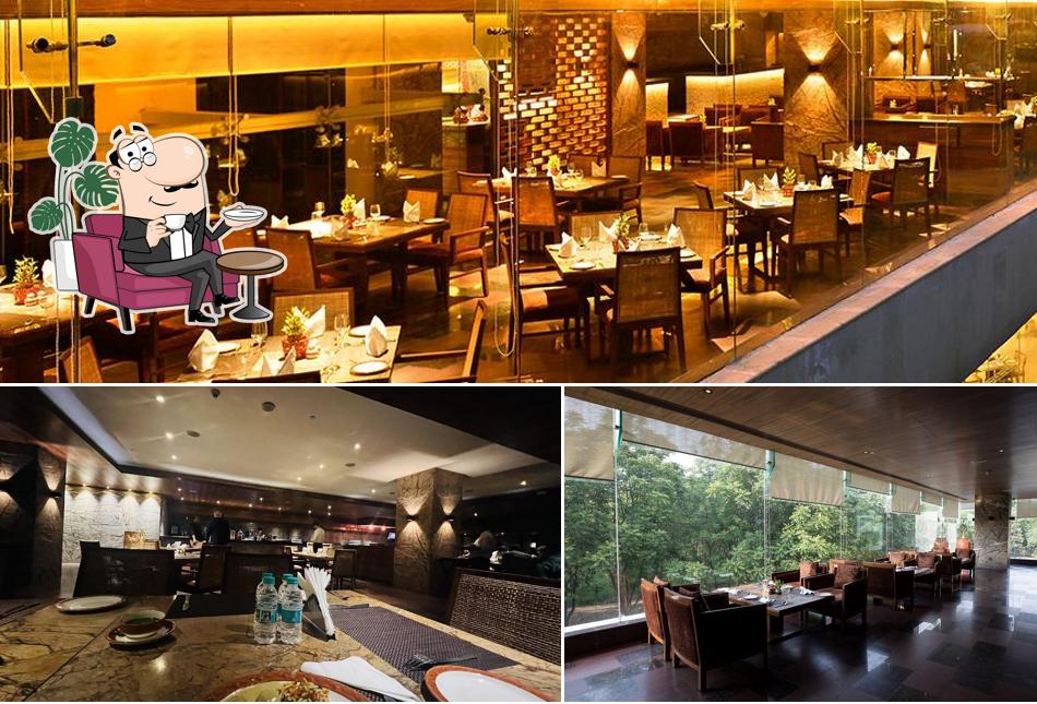 Take a seat at one of the tables at Baluchi - A Pan Indian Destination