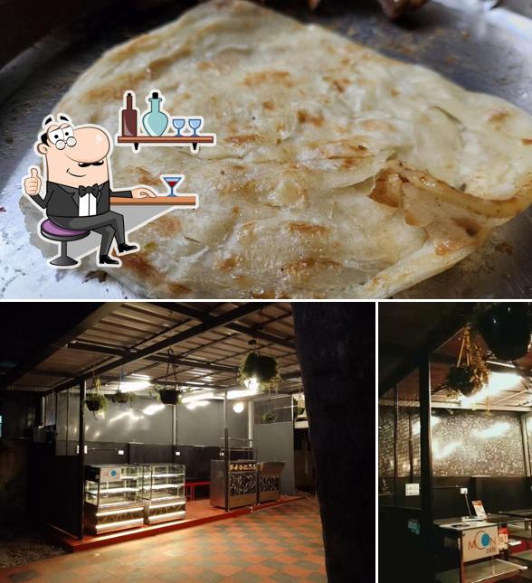 This is the image depicting interior and food at Moon Café