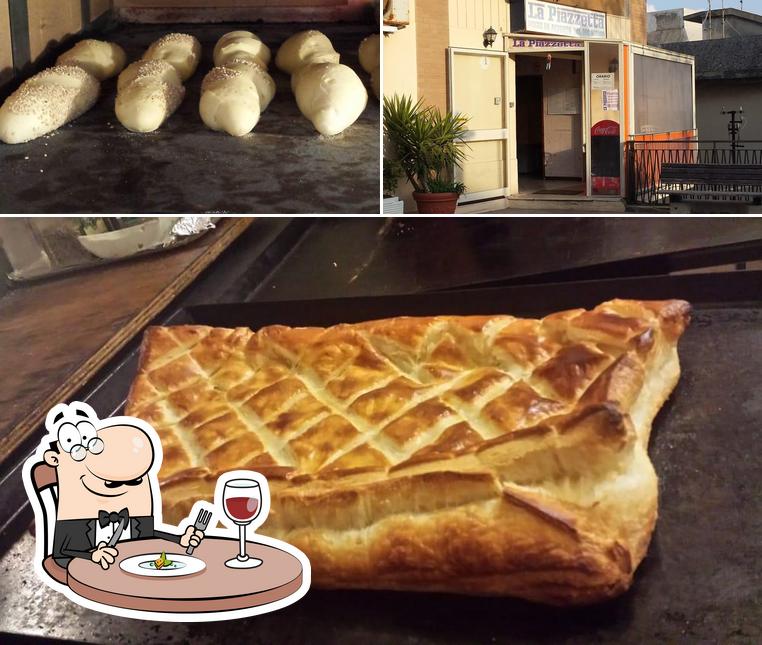 Dai un’occhiata alla foto che raffigura la cibo e esterno di La Piazzetta
