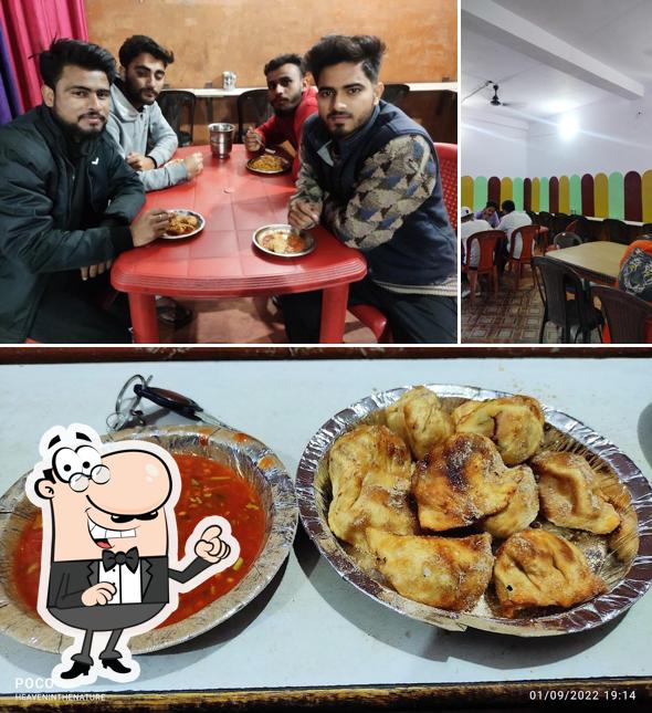 The photo of interior and food at Aman Fast Food Corner