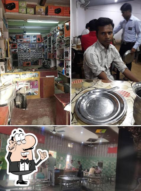 The interior of Nirban Veg & Non-Veg Hotel