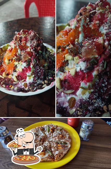 At HONEYCUBE TAWA ICE CREAM & Pizza CAFE, you can try pizza