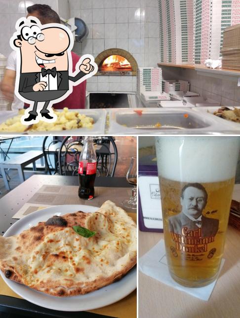 La foto della interni e birra di Pizza Casa