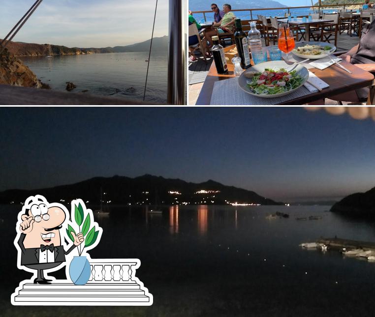 Dai un’occhiata alla foto che mostra la esterno e interni di Osteria di Mare Enfola