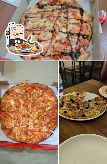 Get pizza at Taka Pizza