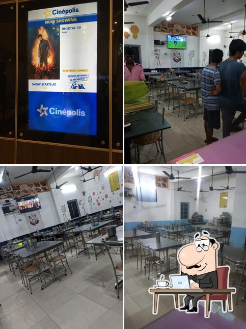 Take a seat at one of the tables at NAIDU ANDHRA MESS