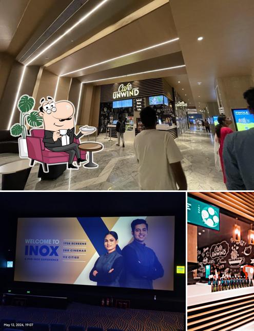 The photo of interior and bar counter at Cafe Unwind - INOX, GSM Mall