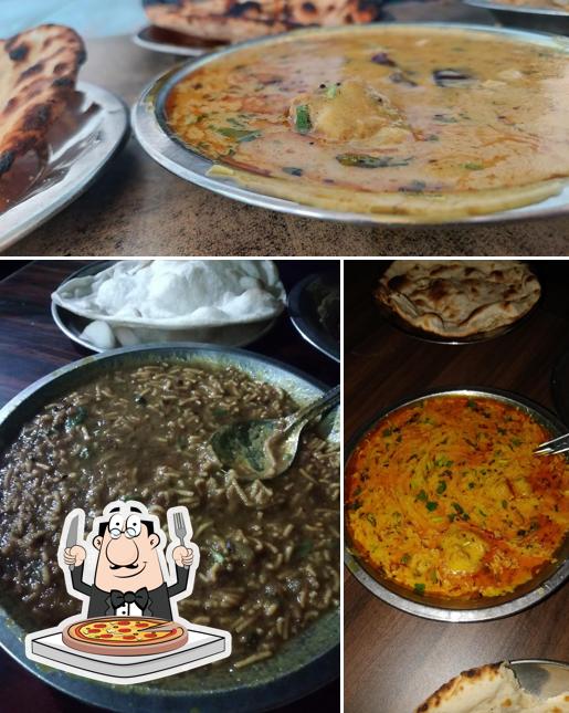 Get pizza at Himalaya Hindu Hotel