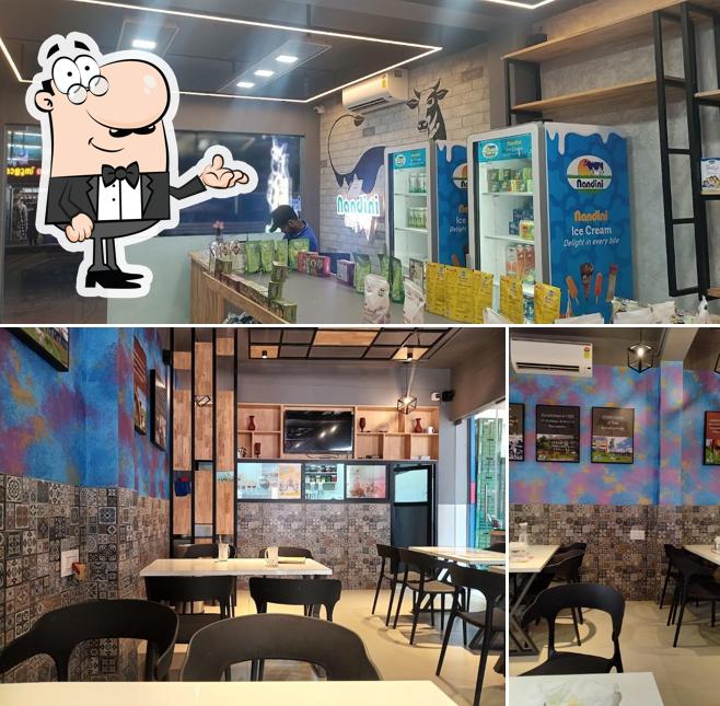 The interior of NANDINI CAFE MOO, SPS PLAZA EDAPPAL