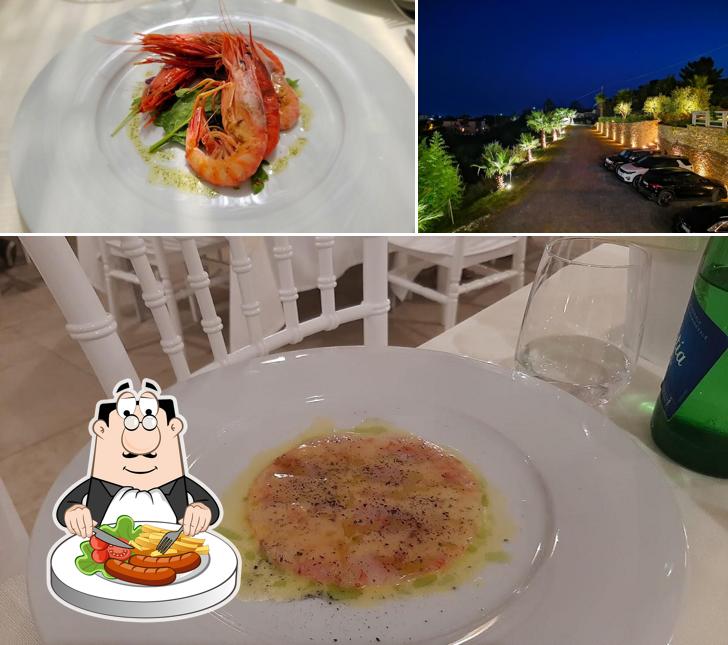 Questa è la immagine che presenta la cibo e esterno di Ristorante La Taverna Del Conte