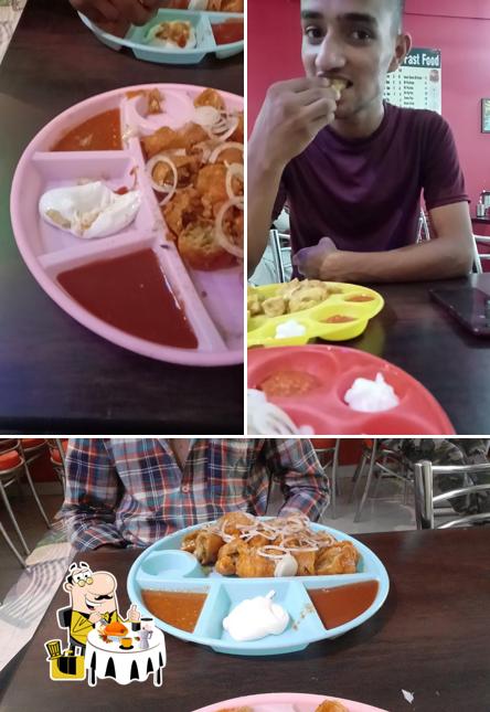 The picture of food and dining table at VIP Fast Food Restaurant Bhadram