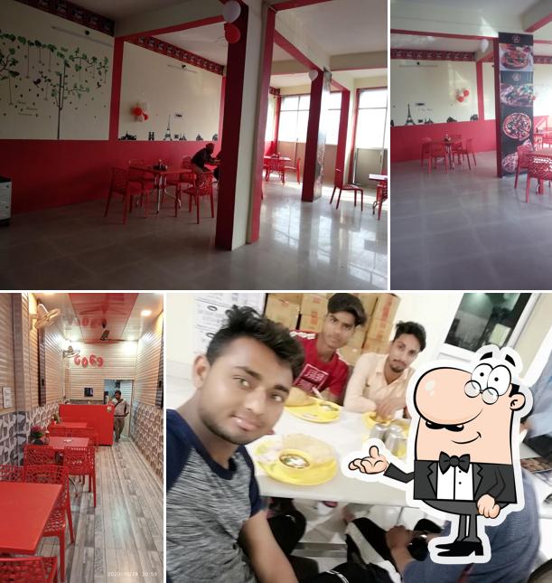 Take a seat at one of the tables at Go Pizza Gola