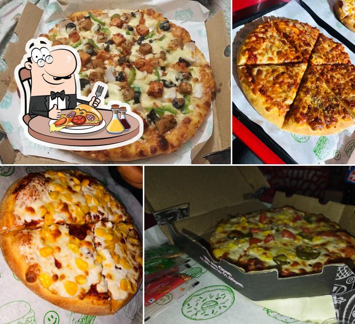 Get pizza at Moms Magic Pizza Corner