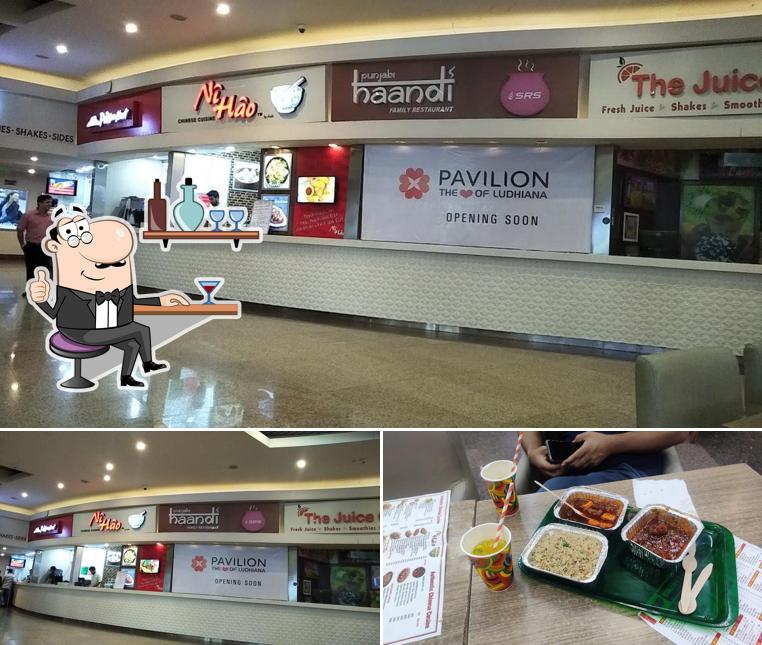Take a look at the picture showing interior and food at Ni Hao Chinese Cuisine