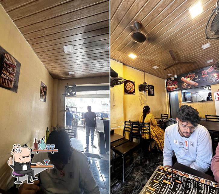 Take a seat at one of the tables at DOSA TOWN
