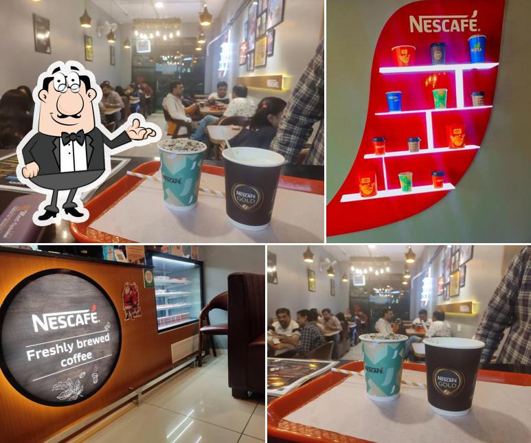 Take a seat at one of the tables at Nescafé