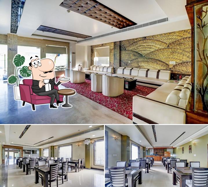 Take a seat at one of the tables at Hotel Sanskar