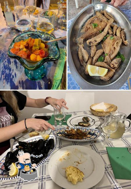 Questa è la immagine che presenta la cibo e interni di A Paranza di Nenè - Trattoria specialità pesce
