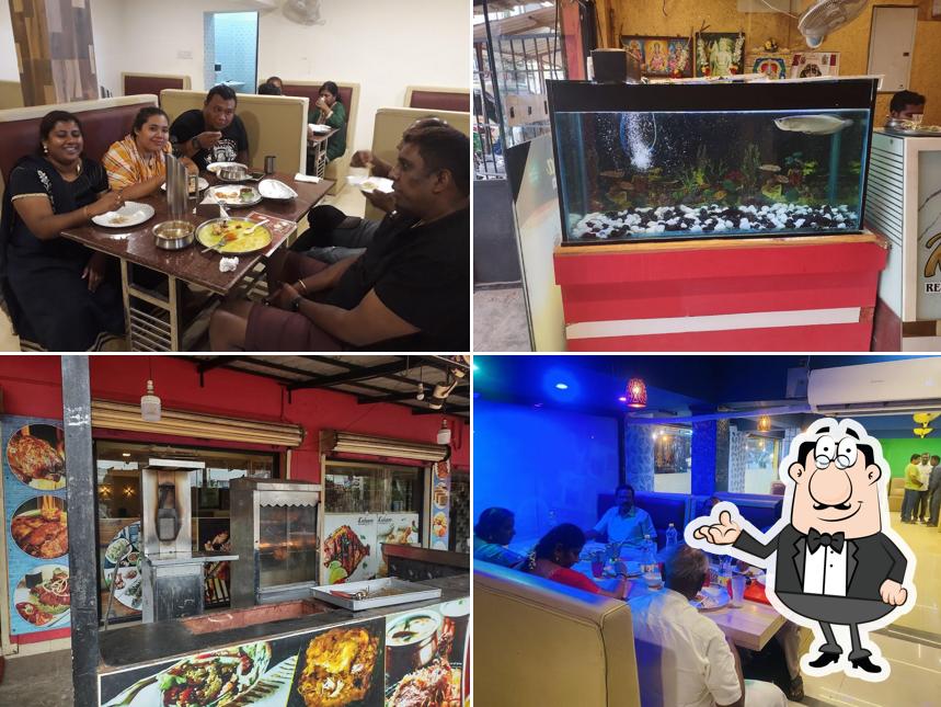 Take a seat at one of the tables at Kalappa Family Restaurant A/C