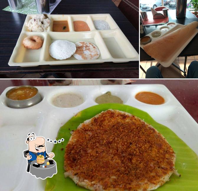 The image of Namma Veedu Vasanta Bhavan’s food and dining table