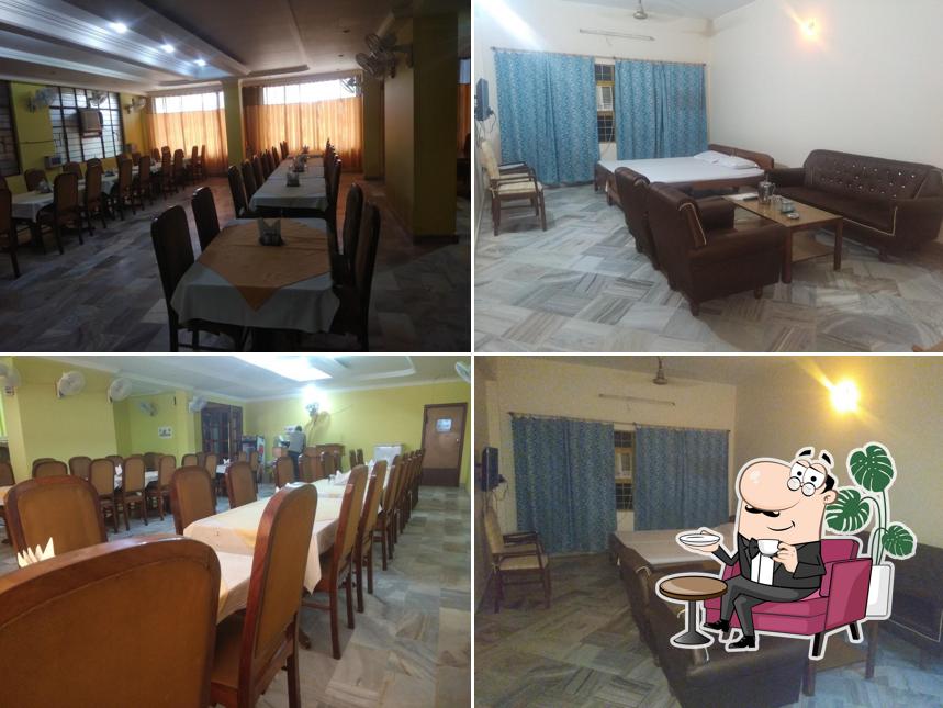 Take a seat at one of the tables at Motel Sayonara