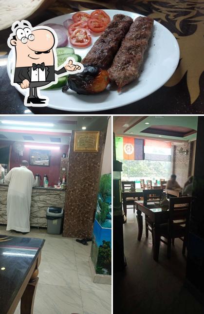 This is the image depicting interior and food at Wali-Alasr مطعم ولی العصر