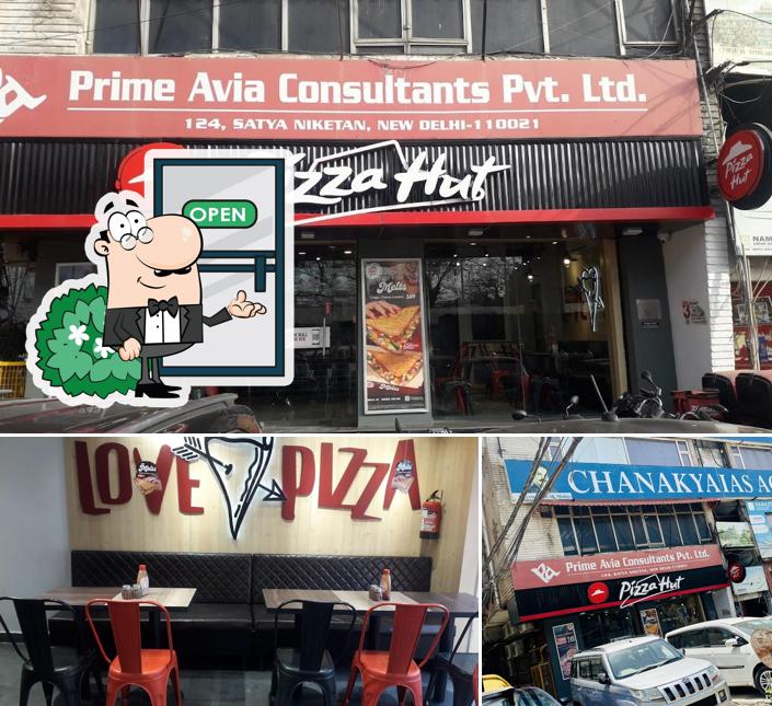 Check out the photo displaying exterior and interior at Pizza Hut Satya Niketan, Delhi