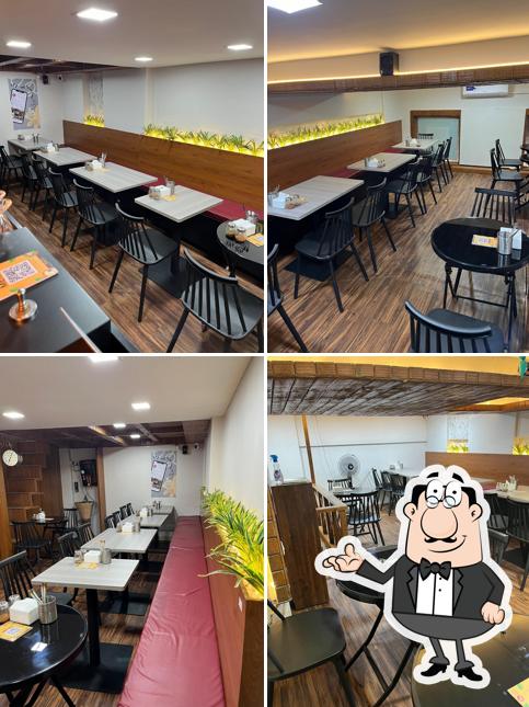 Take a seat at one of the tables at Foodlingo Cafe