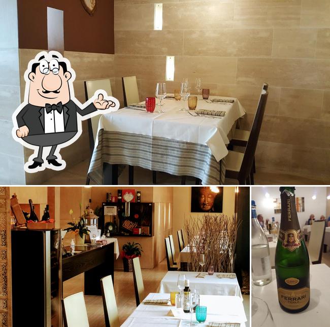 Questa è la immagine che presenta la interni e birra di Ristorante Quantum