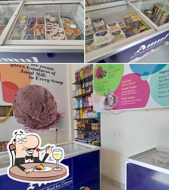 AMUL ICECREAM PARLOUR PREM ENTERPRISES MANMAD is distinguished by food and interior