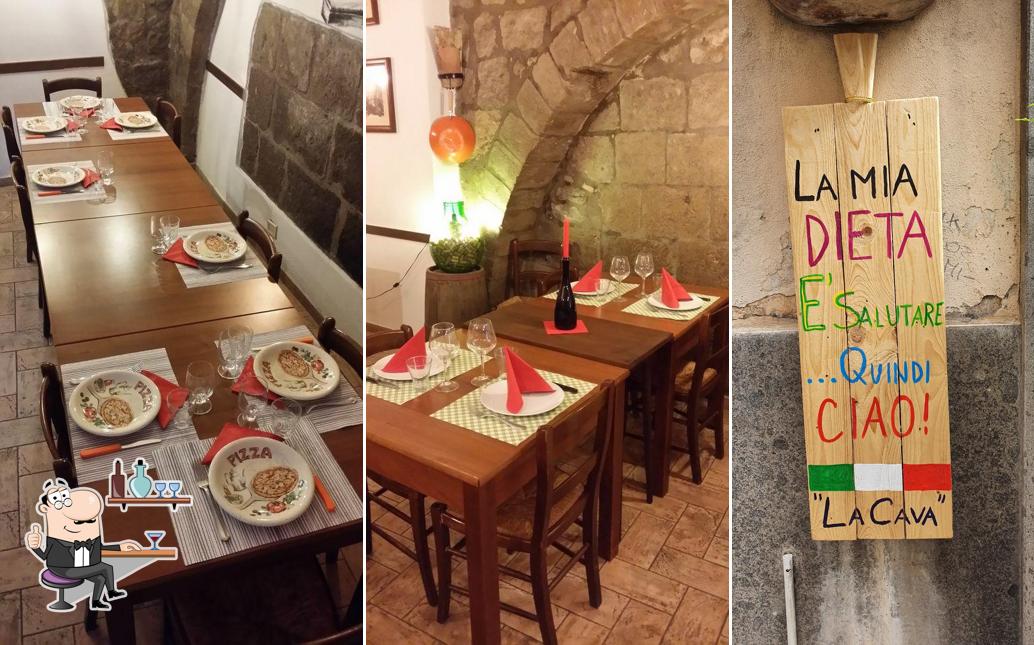 Dai un'occhiata agli interni di La Cava Pizzeria
