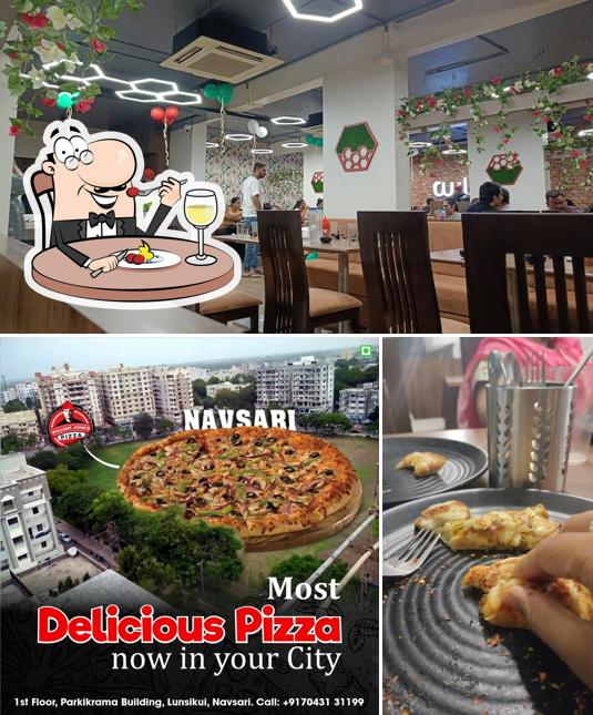 This is the picture showing food and interior at William Johns Pizza Navsari