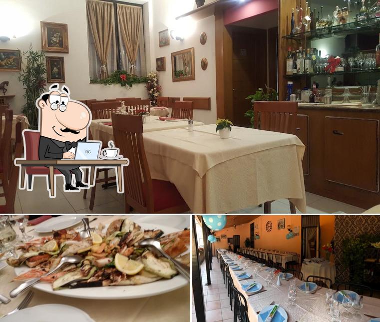 Questa è la immagine che presenta la interni e cibo di Ristorante Da Terry