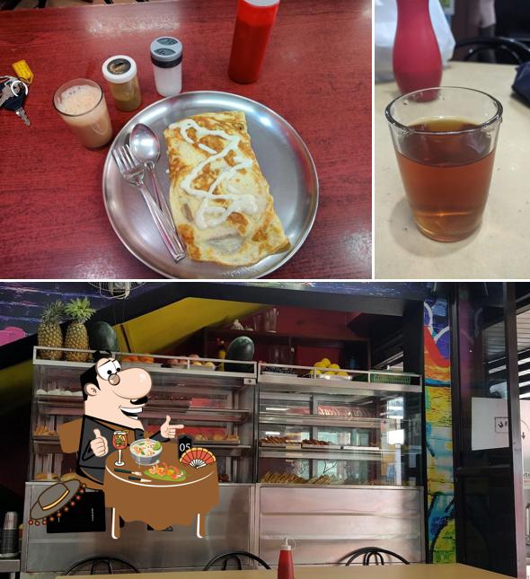 Take a look at the photo showing food and beer at Kadayil Oru Thattu Kada
