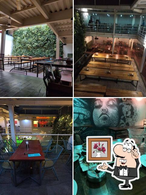 Take a seat at one of the tables at 1131 Bar + Kitchen