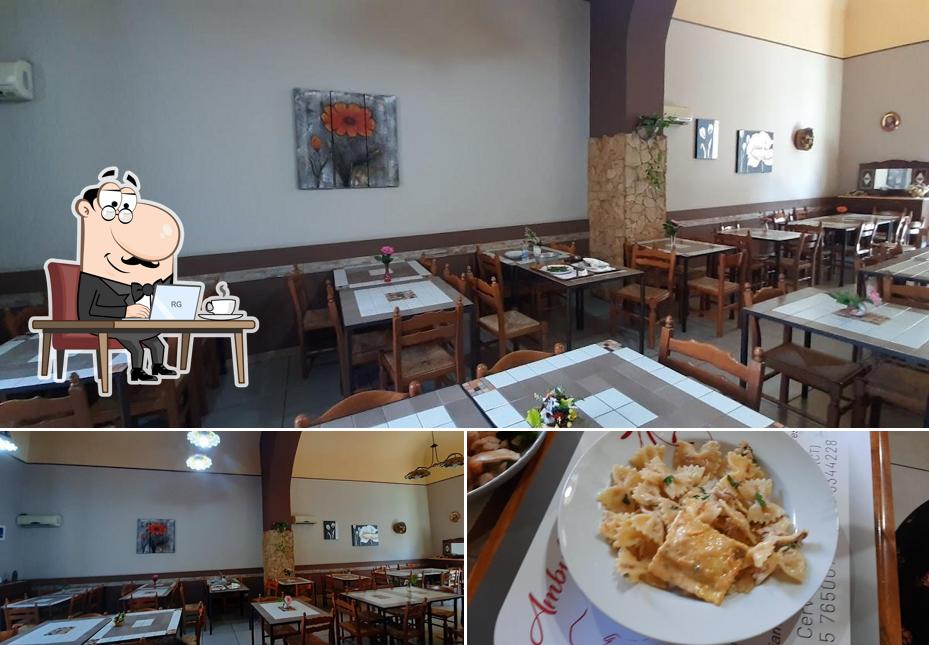 Guarda la foto che presenta la interni e cibo di Il re dello Street Food