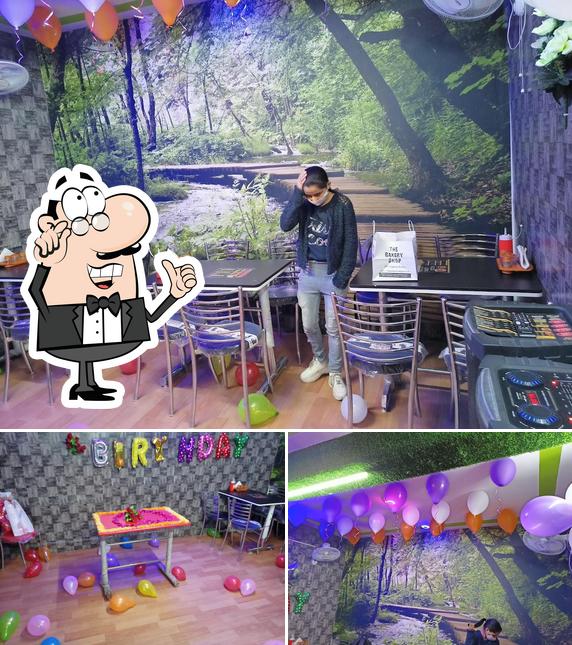 The image of Pizza Zone & Party Hall’s interior and exterior