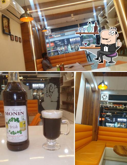 The photo of interior and food at Cafe Divine