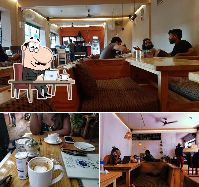 Take a seat at one of the tables at Cool Talk Cafe