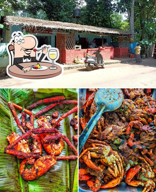 Take a look at the photo depicting food and exterior at Kunjuettantey nadan kada