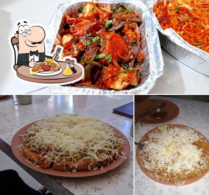Try out pizza at TRUPTI SNACKS
