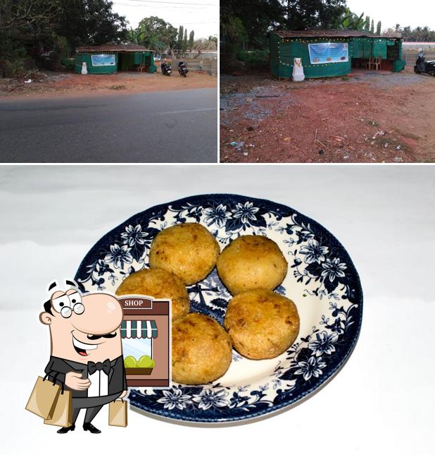 Check out the photo showing exterior and food at Tessy's Fastfood Authentic Goan Snacks