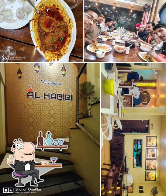 Take a seat at one of the tables at Al-Habibi