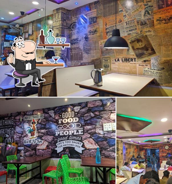 Take a seat at one of the tables at Kwality Hotel